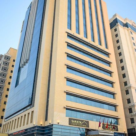 Saraya Corniche Hotel Doha Exterior photo The headquarters of the National Bank of Kuwait in Kuwait City