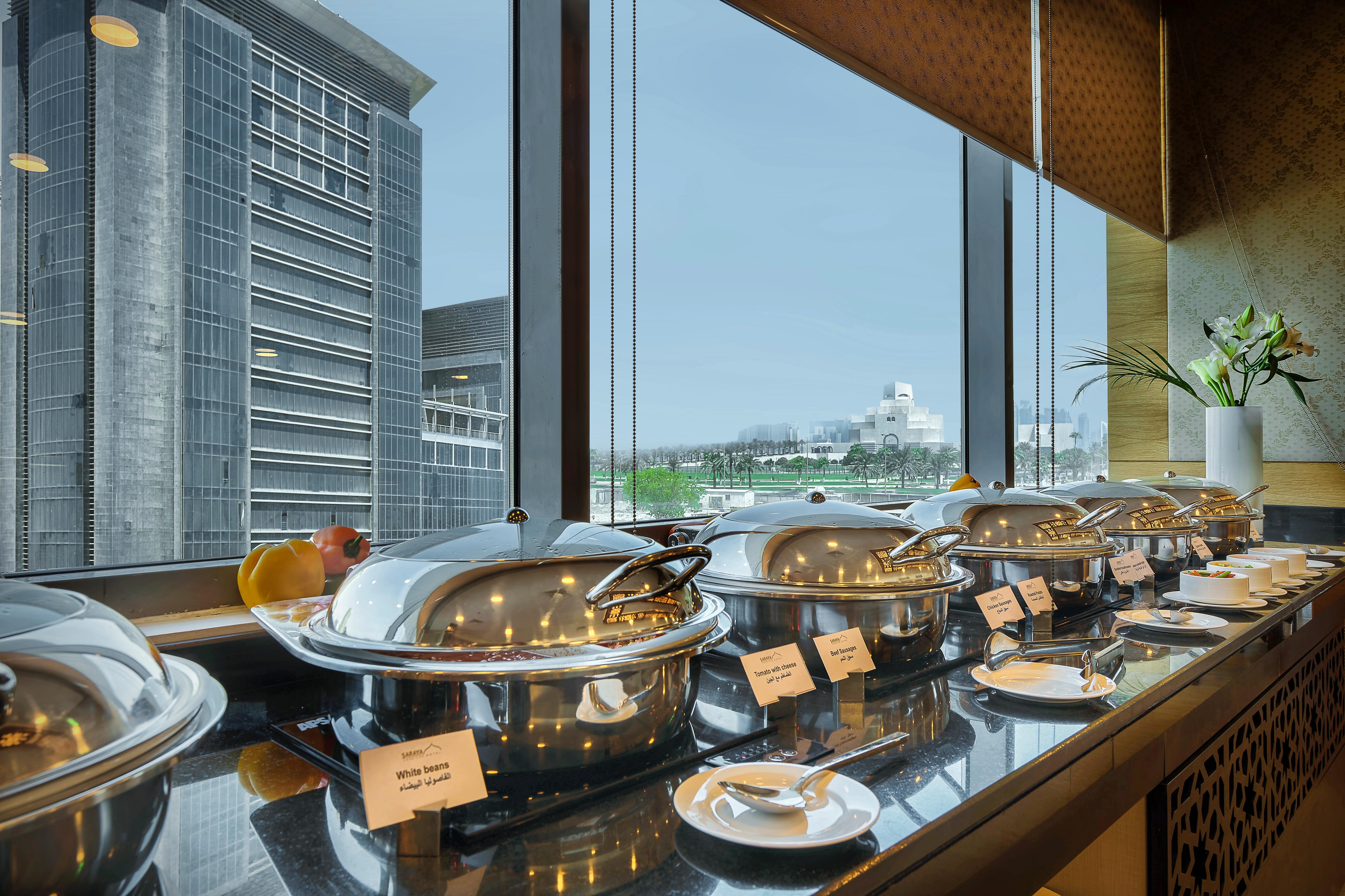 Saraya Corniche Hotel Doha Exterior photo A buffet at a hotel