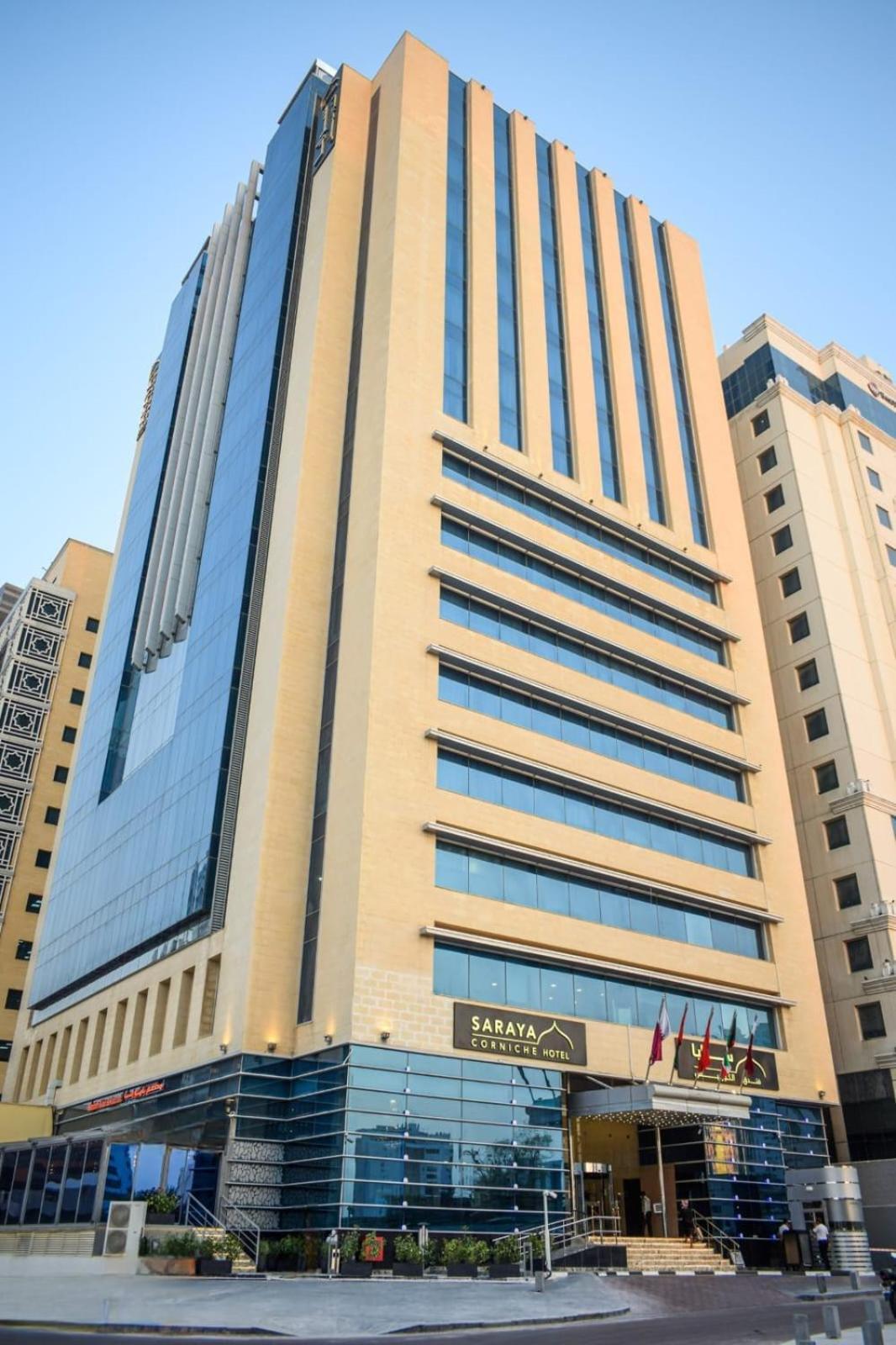 Saraya Corniche Hotel Doha Exterior photo The headquarters of the National Bank of Kuwait in Kuwait City